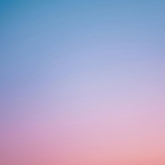 A soft pink and blue evening sky