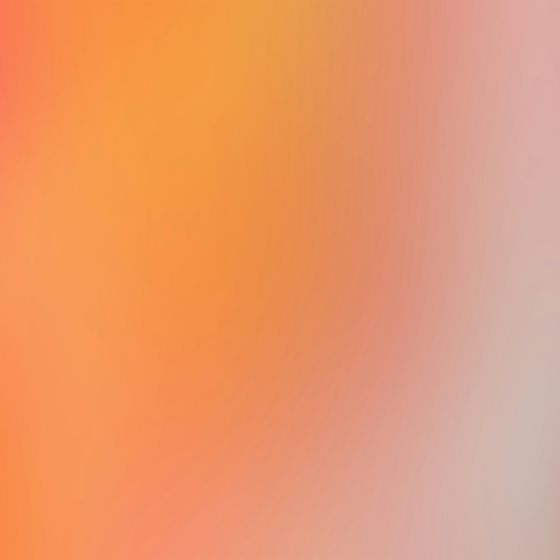 A blurred warm sunset over water